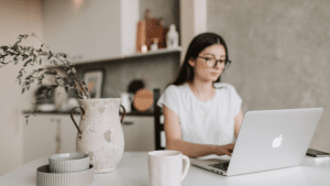 An employee doing her tasks at the comfort of her own home