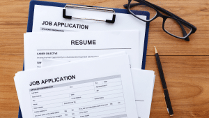 A pile of resume and job applications 