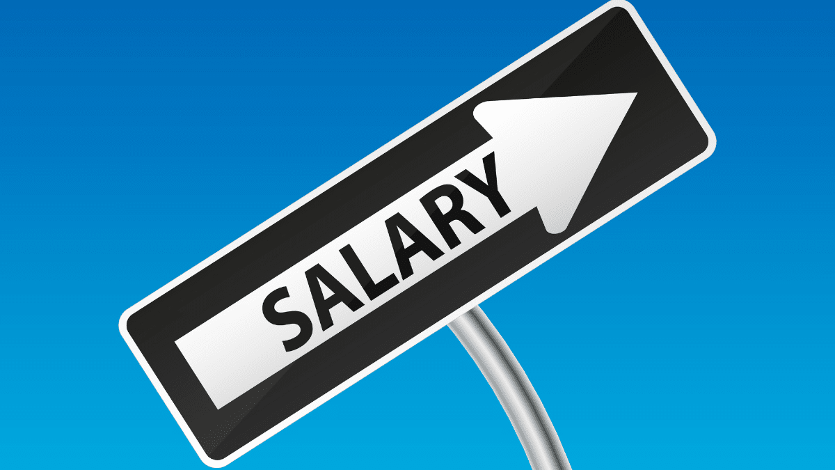 A road sign pointing to salary